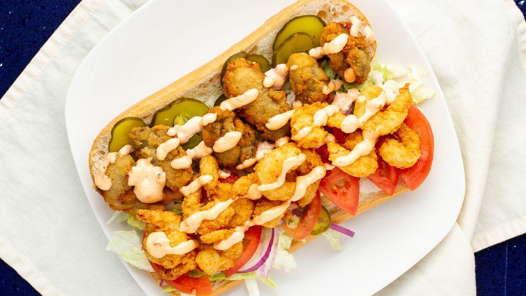 Fried Oyster And Shrimp Poe Boy · Lettuce, tomato, onion, pickle, and remoulade sauce.