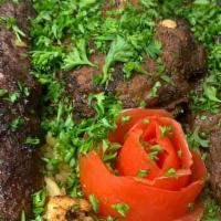 Mix Shawarma Platter (Lamb/Beef & Chicken) · Grilled thin cuts of chicken and (lamb/beef) marinated in shawarma spices. Served with rice,...