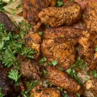 Grilled Lamb & Beef Kofta Platter (Iraqi Kabob) · Ground lamb and beef kofta served with tzatziki sauce. Served with rice or fries and pita br...