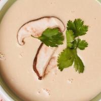 Coconut Soup Cup · coconut soup, mushrooms, scallions, cilantro