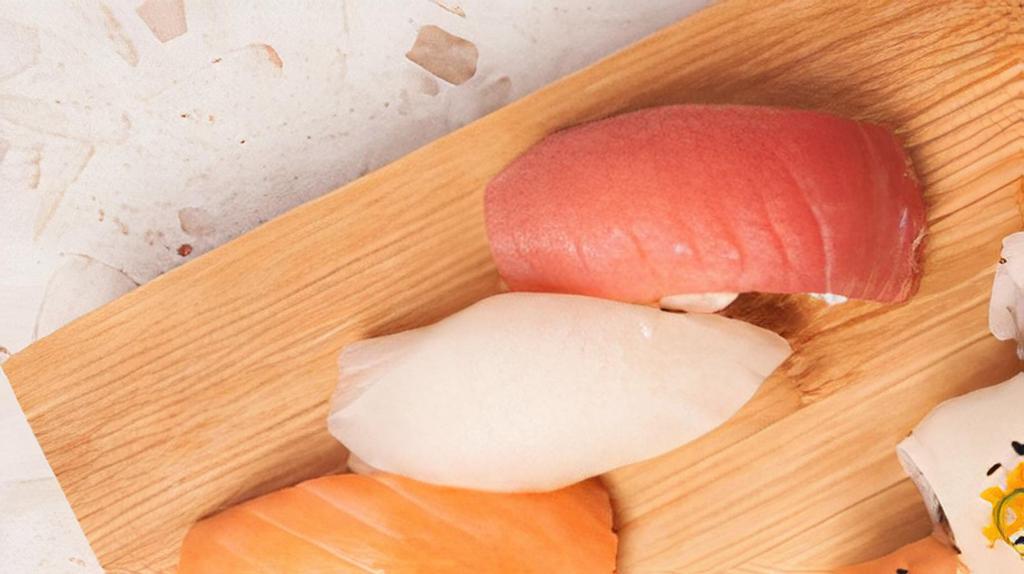 Nigiri · Choose fresh tuna or salmon - on top of sushi rice