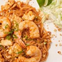 Pad Thai · rice noodle, chicken, shrimp, egg, cabbage, green onion, peanut, lime