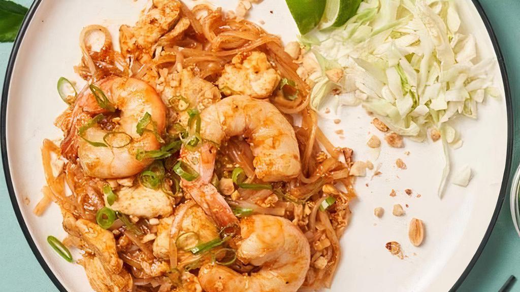Pad Thai · rice noodle, chicken, shrimp, egg, cabbage, green onion, peanut, lime