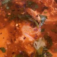 Menudo · Tripe and chili pepper base soup.