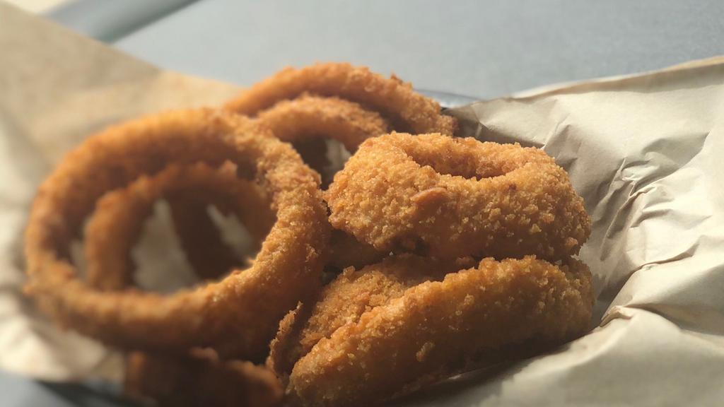 Onion Rings · Coated in crispy batter and deep fried for an awesome crunch.