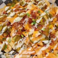 Loaded French Fries · Topped with Cheddar, Ranch, Bacon, Green Onions.