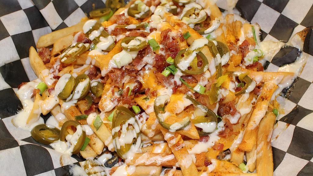 Loaded French Fries · Topped with Cheddar, Ranch, Bacon, Green Onions.