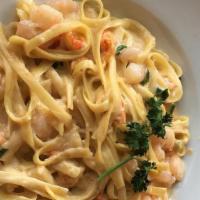 Seafood Fettuccine  · Sauteed shrimp, crawfish, white wine cream sauce, green onions, parmesan cheese and fettucci...