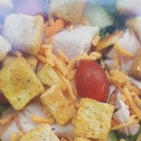 Glenn St Salad · Greens, boiled egg, cheddar cheese, tomatoes, cucumbers, onions, carrots, croutons. Choice o...