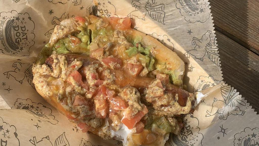 Crawfish Etouffee Dog · Contains pork. Crawfish sausage with crawfish etouffee, sour cream, onions, tomatoes, and creole mustard.*

*CREOLE MUSTARD UNAVAILABLE AS A TOPPING UNTIL 7/21*