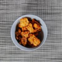 Orange Chicken · Battered and cooked in a sweet orange sauce. poultry.