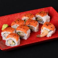 Pink Dragon Roll · Shrimp tempura, cream cheese, and tobiko topped with tuna and spicy mayo.