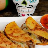  Tacos De Barbacoa · Three corn tortillas filled with slow cooked beef, cheese, cilantro and onions, then grilled...