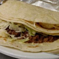 Soft Tacos (3) · Soft flour tortillas filled with ground beef or chicken, lettuce and cheese.