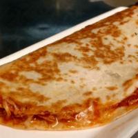 Chicken Quesadilla · Flour tortilla folded, stuffed with cheese, shredded chicken and a little refried beans, the...