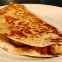 Shrimp Quesadilla · Flour tortilla folded, stuffed with cheese, grilled shrimp and a little refried beans, then ...