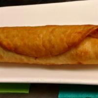 Chimichanga · Flour tortilla wrapped around choice of filling.  Served soft or fried.  Topped with cheese ...