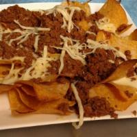 Nachos With Beef · Toasted chips topped with melted cheese and ground beef.