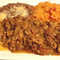 Chile Verde Con Carne · Pork tips cooked with salsa verde. Served with Spanish rice, refried beans and corn or flour...