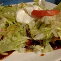 Enchilada Suprema · A supreme combination of enchiladas: one chicken, one bean, one cheese and one beef. Topped ...