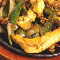  Chicken Fajitas · Chicken grilled with onions, peppers and tomatoes.