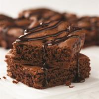Double Chocolate Brownie · Made with Ghirardelli® chocolate and topped with a drizzle of Ghirardelli® chocolate sauce.