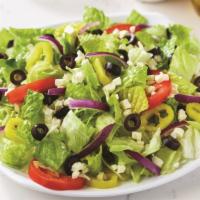 Greek Salad · Fresh-cut lettuce blend, feta cheese crumbles, black olives, sliced tomatoes, red onions, an...
