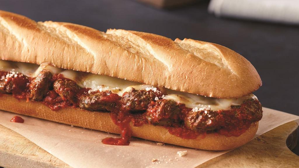 Meatball Sub · Meatballs, provolone cheese and our signature sauce