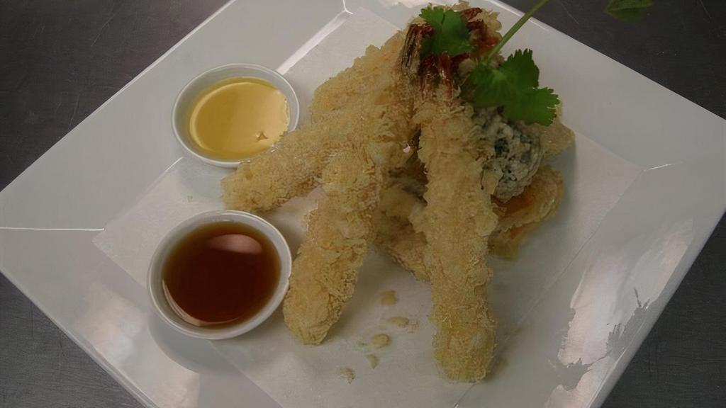 Shrimp Tempura Roll · Two pieces shrimp tempura, avocado, cucumber.