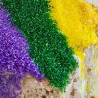 King Cake Rum Cream Bread Pudding · Topped with rum sauce made with
 Gambino’s King Cake Rum Cream