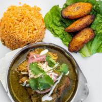 Piggy Maya · Our delicious pork carnitas cooked with a green poblano sauce, slices of poblano pepper, gar...