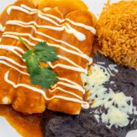Las Marias · Three shredded chicken or ground beef enchiladas with our adobo red sauce, garnished with so...