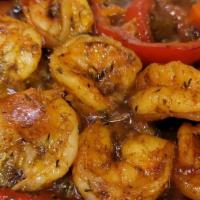 Curry Shrimp · Juicy Jumbo Shrimp sautéed with onions, bell peppers in Jamaican Curry over a bed of rice & ...