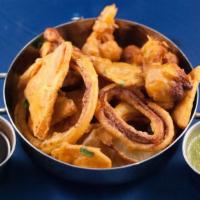 Mix Veg Pakora · Crispy fritters of assorted vegetables. Served with mint and tamarind chutneys. Gluten-free,...