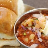 Pav Bhaji · A perfectly spiced mash of minced vegetables, served with two buttered buns. Can be made veg...