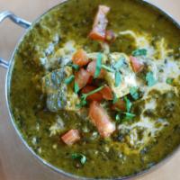 Palak Paneer · Cottage cheese chunks cooked in a thick, fragrant spinach gravy. (gluten-free)