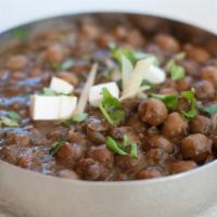 Chana Masala · Savory chickpea curry. Gluten-free, can be made vegan and dairy-free with special request.