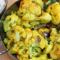Aloo Gobi Masala  · Cauliflower and potatoes cooked with traditional Indian spices and herbs. (vegan, dairy-free...