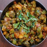 Achari Bhindi Masala · Spicy and tangy okra cooked with onions and tomatoes. (vegan, dairy-free, gluten-free)