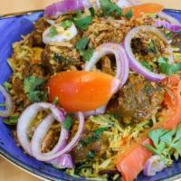 Goat Biryani · Flavorful and aromatic mixed rice dish with vegetables and tender bone-in goat meat. Served ...