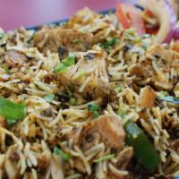 Kathal (Jackfruit) Biryani · Flavorful mixed rice dish with vegetables and delicious, tender jackfruit chunks. Served wit...