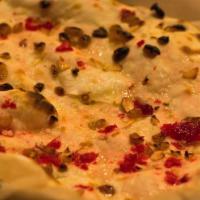 Peshawari Naan · Classic oven-baked flatbread with a sweet-tasting twist (includes nuts and cherries).