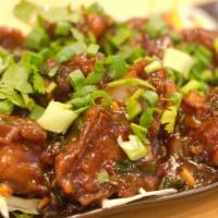 Gobi Manchurian · Crispy cauliflower florets cooked in a savory manchurian sauce. (vegan, dairy-free)