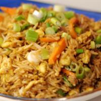 Egg Fried Rice · Fried rice with egg and fresh-vegetables prepared with Indo-chinese spices in a wok. Dairy-f...