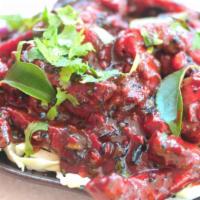 Chicken 65 · Spicy chicken dish in a red chili sauce. An Indo-Chinese favorite! (dairy-free)