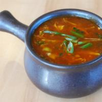 Hot & Sour Soup · Tangy hot & sour soup with chopped vegetables. Dairy-free, veg option is vegan.