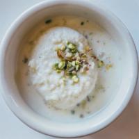 Rasmalai  · Juicy and spongy cheesecake-like Indian dessert soaked in a sweet milk syrup. (contains nuts)