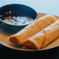 2 Spring Rolls · Savory mixture of vegetables and chicken.