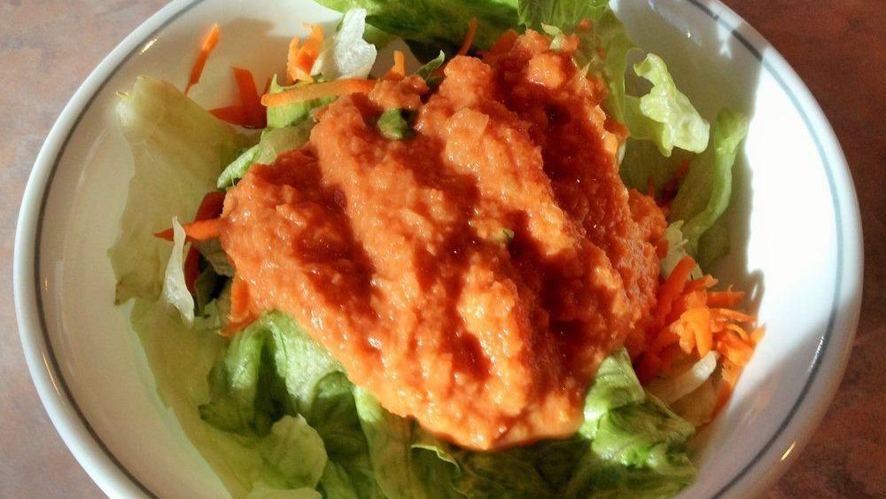 House Salad · Iceberg lettuce, carrots.