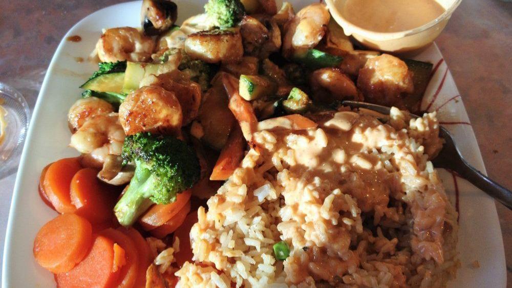 Pork · With rice, vegetables, shrimp sauce, sweet carrots.